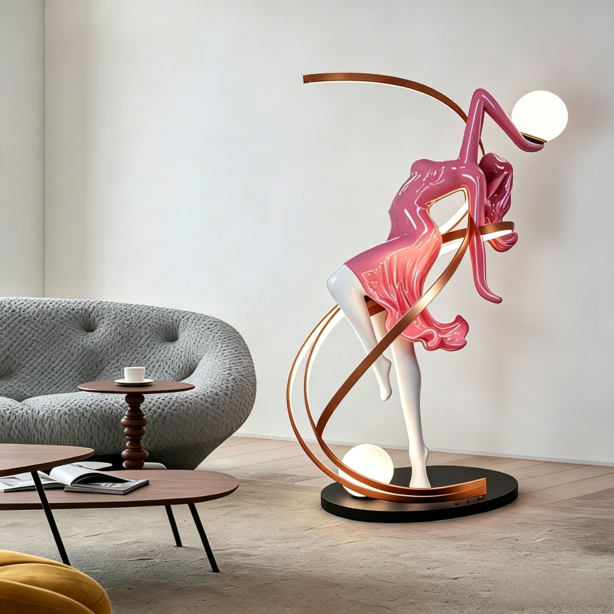 A humanoid art sculpture floor lamp featuring a pink and white dancer figure with curved metallic copper loops and two glowing white globe lights, placed in a contemporary living room.