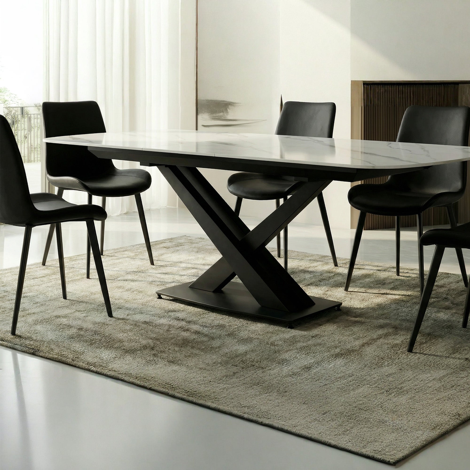Extendable dining table with sintered stone top