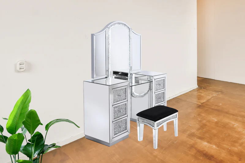 a mirrored vanity set with a stool, placed in a room with wooden flooring