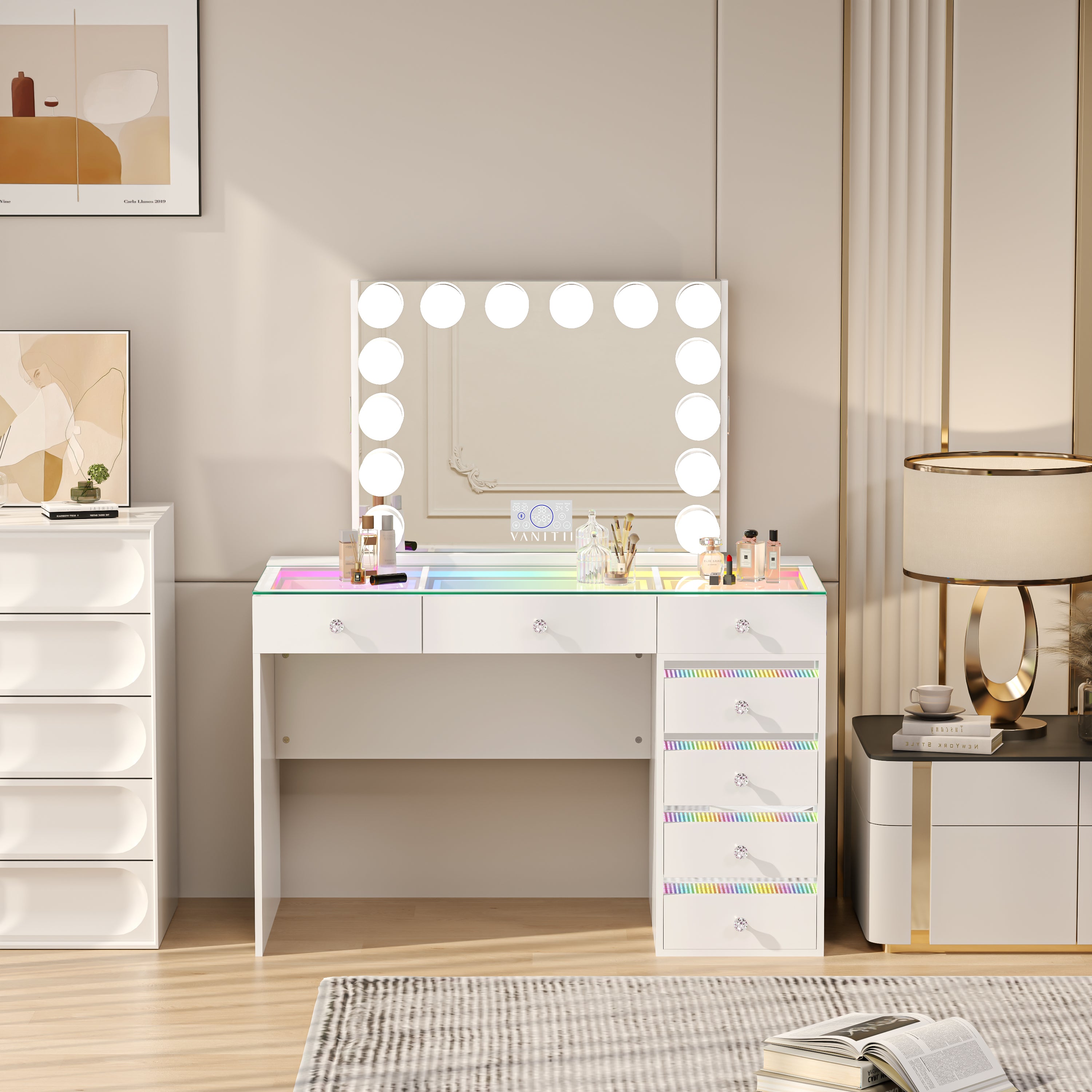 The VANITII Fenair Vanity Desk Set features a 14 LED Light Bulbs , Mirror with Hidden Side Jewelry Racks，7 crystal-knob drawers,USB&Type-C Ports and built-in Bluetooth Speaker. It adopts a simple white design, and it place in the bedroom perfectly combining beauty and functionality.